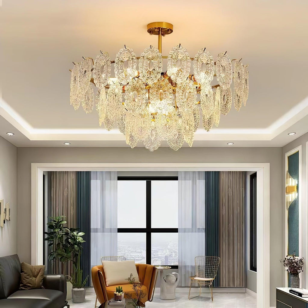 Wide Clérachic glass pendant glowing under a recessed ceiling edge in a living room with a tan armchair and a tall window.