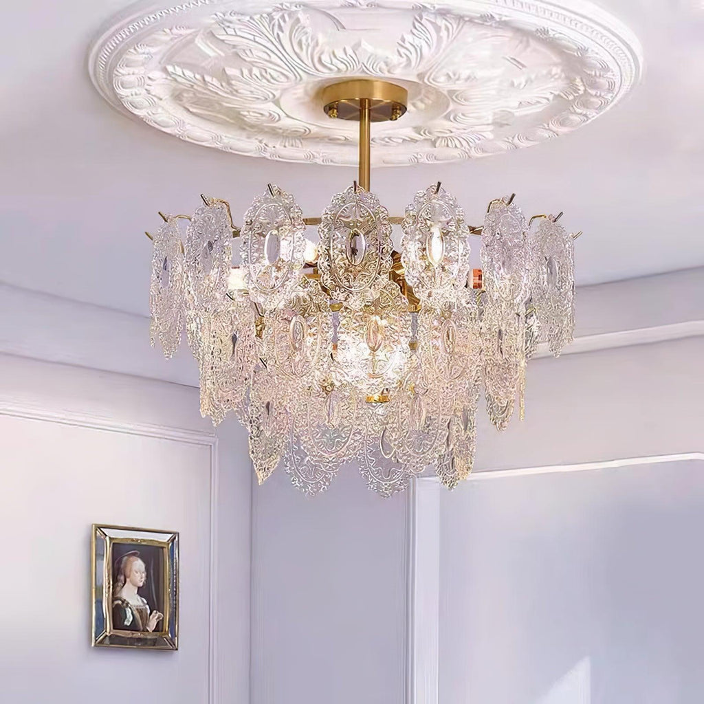 Glowing Clérachic pendant seen from below under a round plaster rose, with a small framed portrait on the lilac wall.