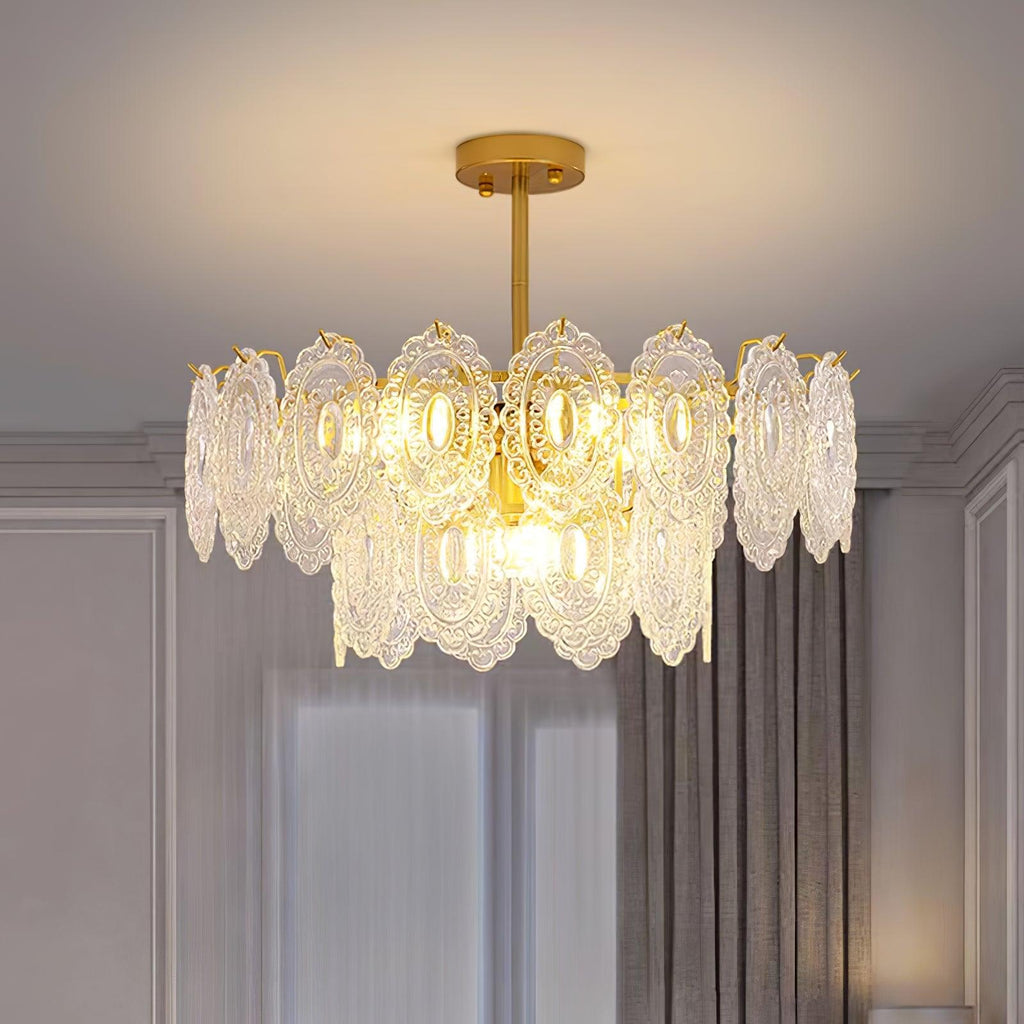 Warm-lit Clérachic pendant in a grey panelled room with a gold canopy, showing the glass panels in close detail.