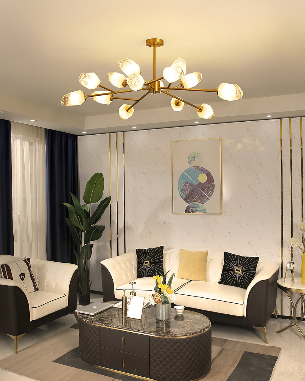 Brass chandelier with warm frosted glass shades above a cream sofa and a black coffee table, a Clérachic light.