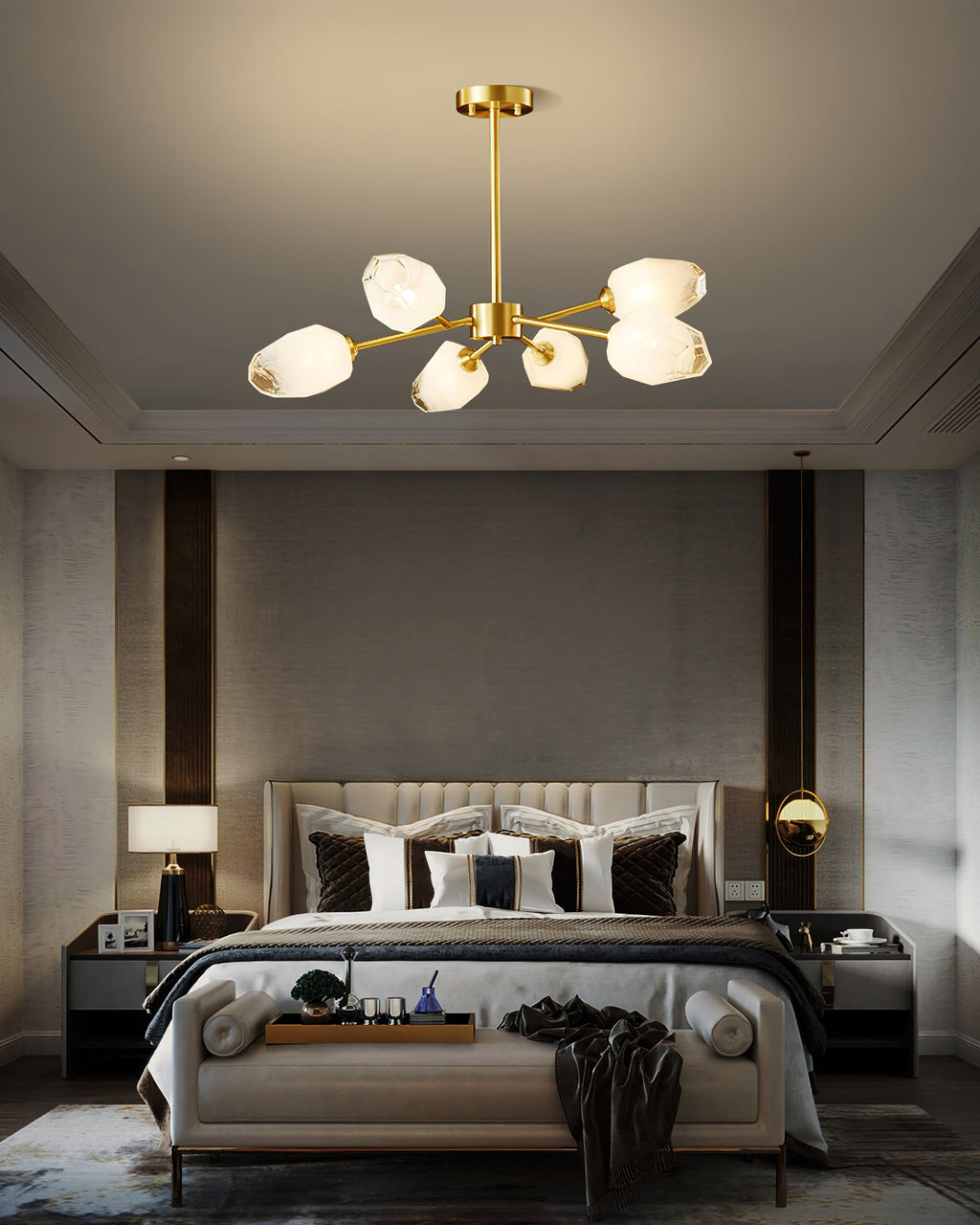 Six-shade Clérachic chandelier hung in a bedroom with a pale headboard, bedside lamps and a dark panelled wall.