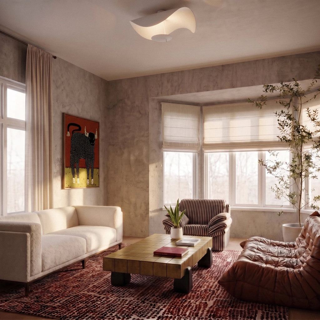 Mounted above a neutral living room, the matte white Clérachic ceiling light complements the muted plaster walls.