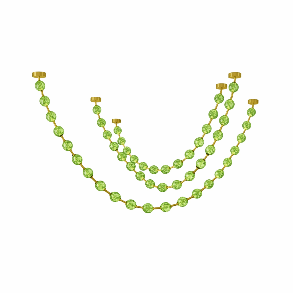 Three nested swags of green spheres on gold links hang in a shallow curve on white, from this Clérachic pendant.