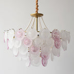 Unlit Clérachic pendant with a gold canopy, pearl strands and rows of pale pink and frosted glass discs, on a grey backdrop.