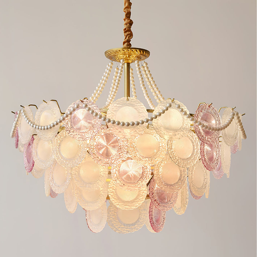 Wide view of the Clérachic pendant lit, with its widest tier of glass discs and a pearl swag looping from the canopy.