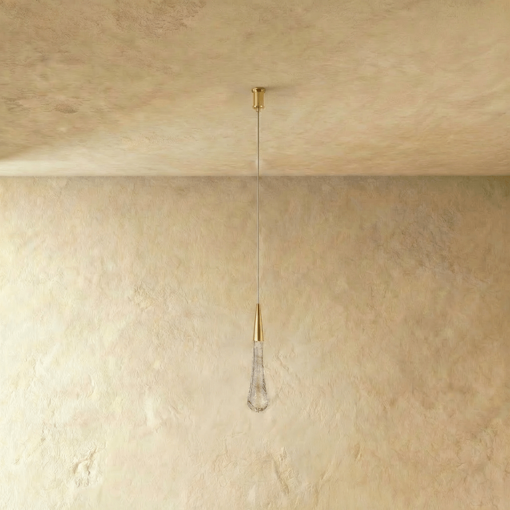 Clérachic unlit teardrop pendant with a brass cone cap and bubbled clear glass drop on a fine cable and slim canopy.