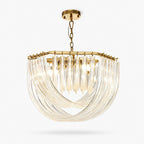Curved clear glass rods sweep down from a gold frame in a wide, shallow bowl, hung on a gold chain from a round canopy, shown on white for this Clérachic pendant.
