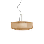 Unlit amber glass Clérachic pendant on a white backdrop, with its faceted shape and the inner shade faintly visible through the glass.