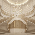 A large cluster of folded shades from this Clérachic pendant light hangs in a grand entrance hall with twin curved stairs.
