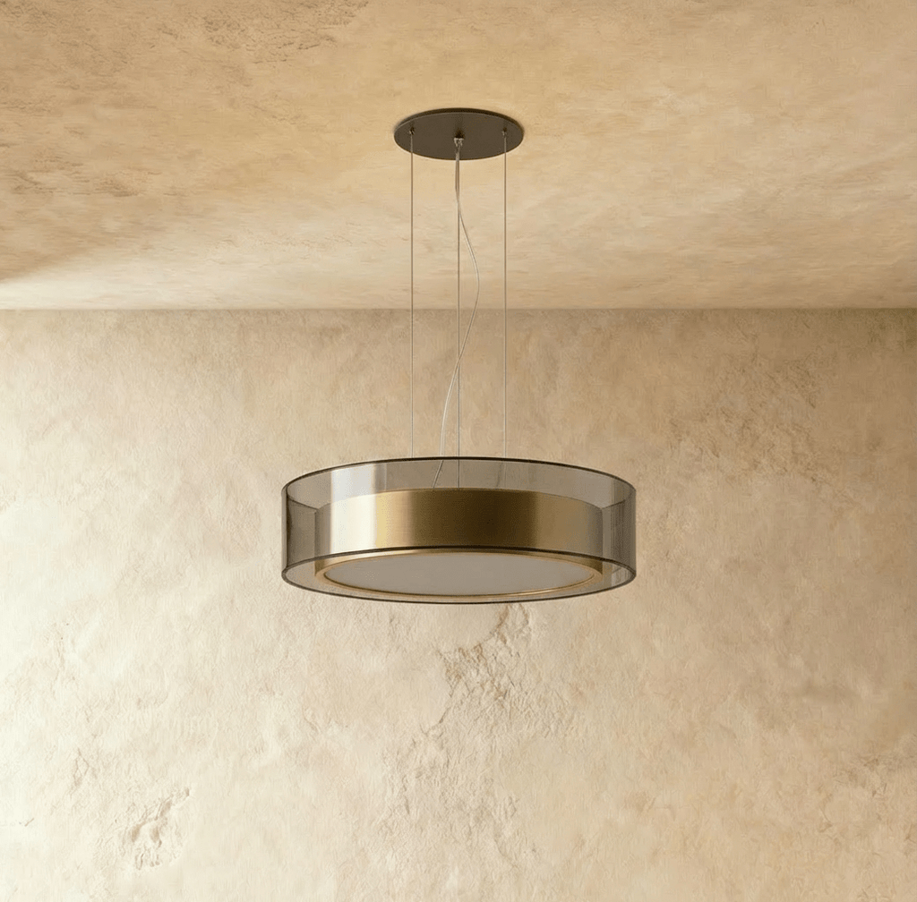 A closer angle of the Clérachic pendant light, its smoked glass drum catching light from below.