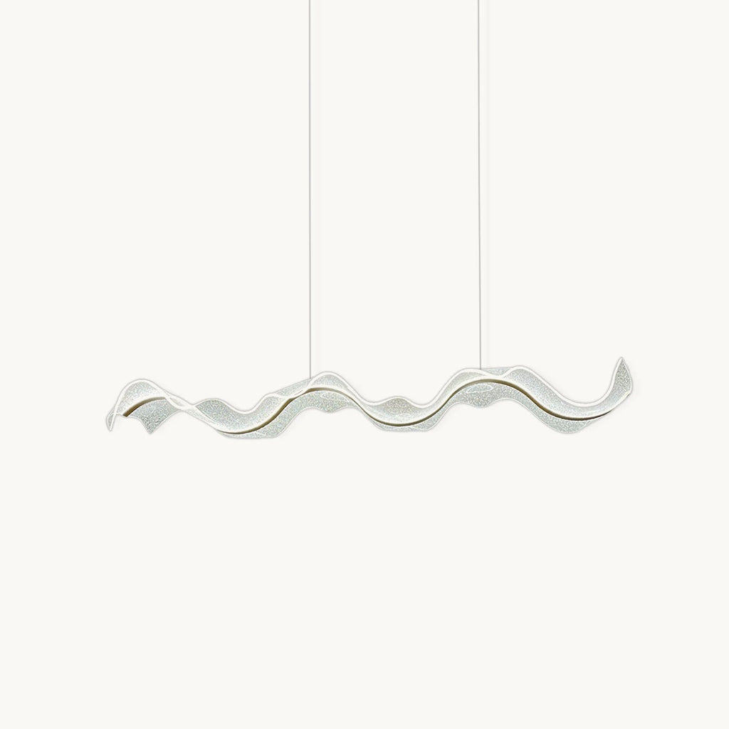Long wavy acrylic shade with a thin gold line, hung on two fine wires, this Clérachic pendant on a plain white backdrop.