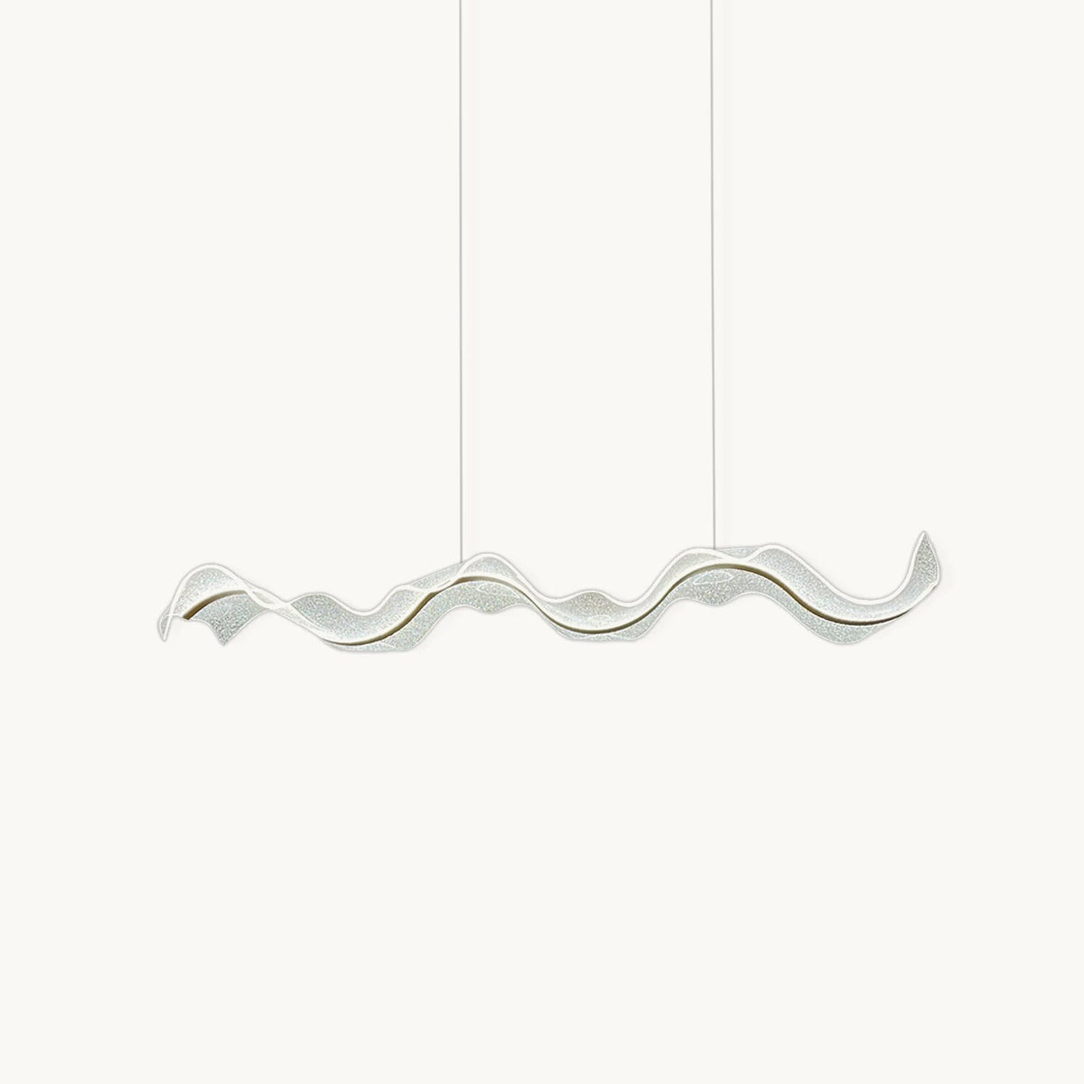 Long wavy acrylic shade with a thin gold line, hung on two fine wires, this Clérachic pendant on a plain white backdrop.