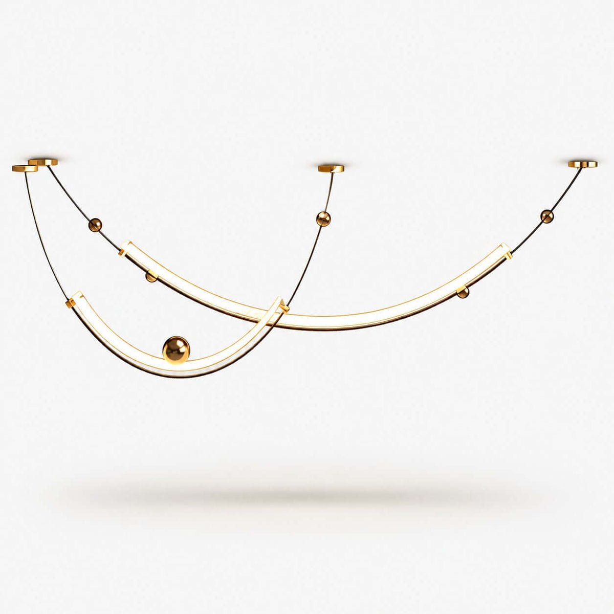 Two curved light strips on thin gold-toned wires with small brass balls, this Clérachic pendant on a plain white backdrop.