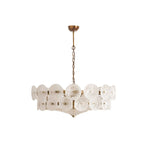White and gold Clérachic chandelier with frosted swirled glass discs, hanging from a brass canopy on a white background.