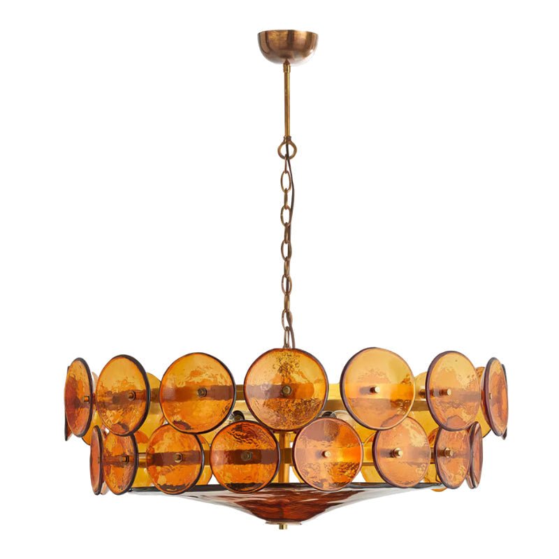 Large amber glass disc chandelier from Clérachic, with two tiers of rimmed discs and an antique brass canopy on white.