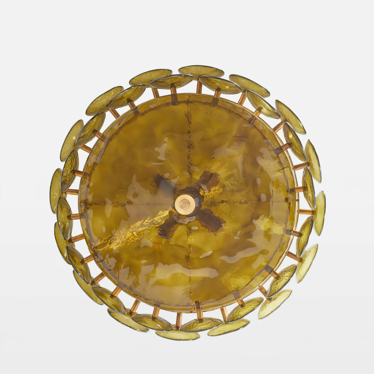 Underside of the green-gold Clérachic chandelier, a round bowl with a brass centre fitting, ringed by overlapping glass discs.
