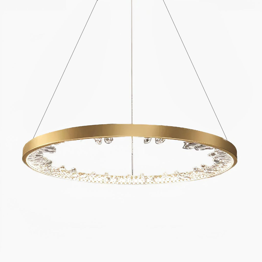 Gold ring Clérachic pendant light with clear crystal-look shades set along the inside of the ring, hung from fine cables, on white.