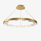 Gold Clérachic ring pendant light on a white background, its slim 4 cm band holding clear shades along the inner edge.