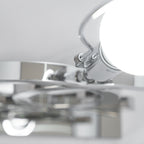 Close view from underneath of the bulb holder and the shiny steel parts inside the shade of this Clérachic table lamp.