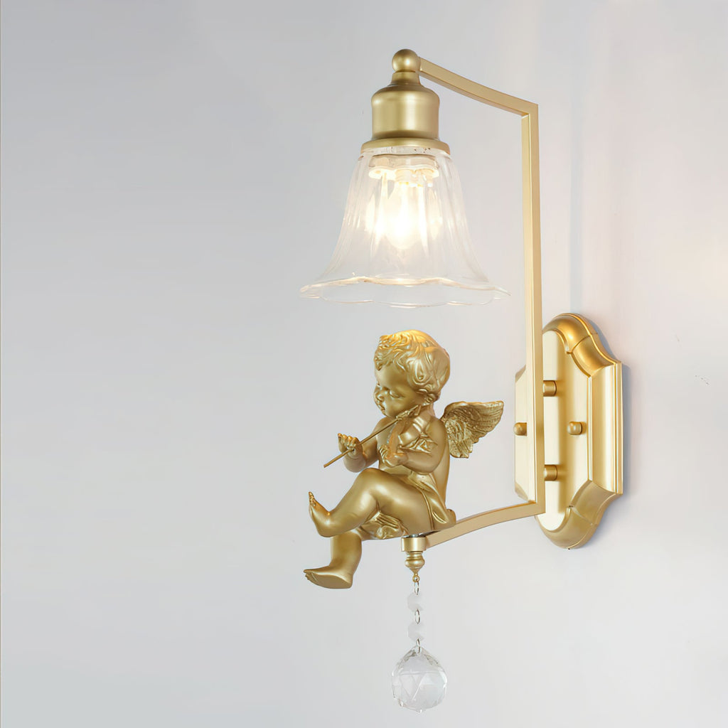 Side view of a Clérachic gold wall light with a square arm, a cherub with a violin and a crystal ball drop below.