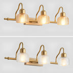 Three-light Clérachic wall lamp pictured twice on pale grey, with amber ribbed shades above and clearer, lighter glass below.