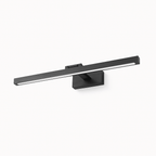 Clérachic wall lamp in black, a slim horizontal LED bar on a rectangular base, shown at an angle against white.