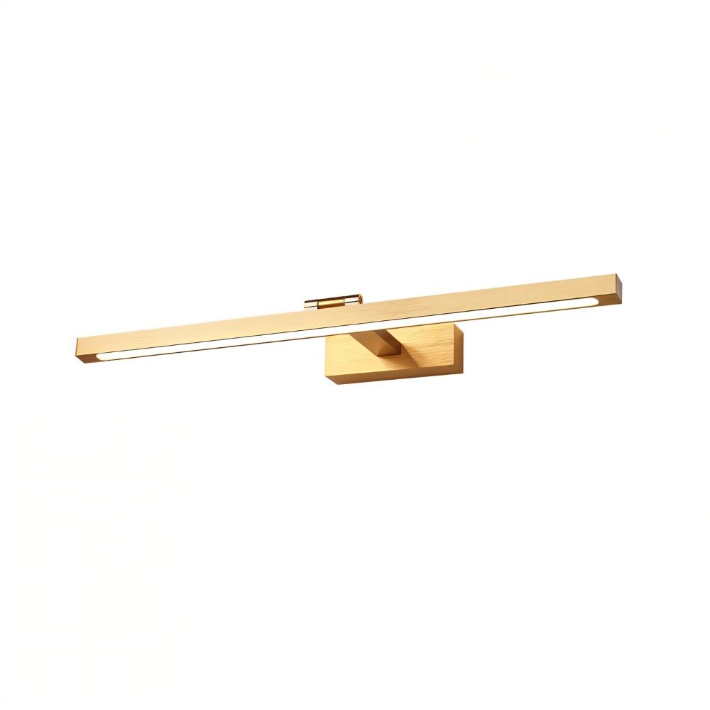 Clérachic wall lamp in gold, its brushed metal bar glowing warmly against a white backdrop.