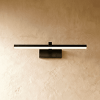 Clérachic black linear wall light with a slender light bar mounted flush on a plaster wall via a rectangular base.