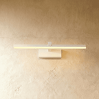 Clérachic white linear wall light with a slim horizontal bar and rectangular wall plate glowing on plaster.