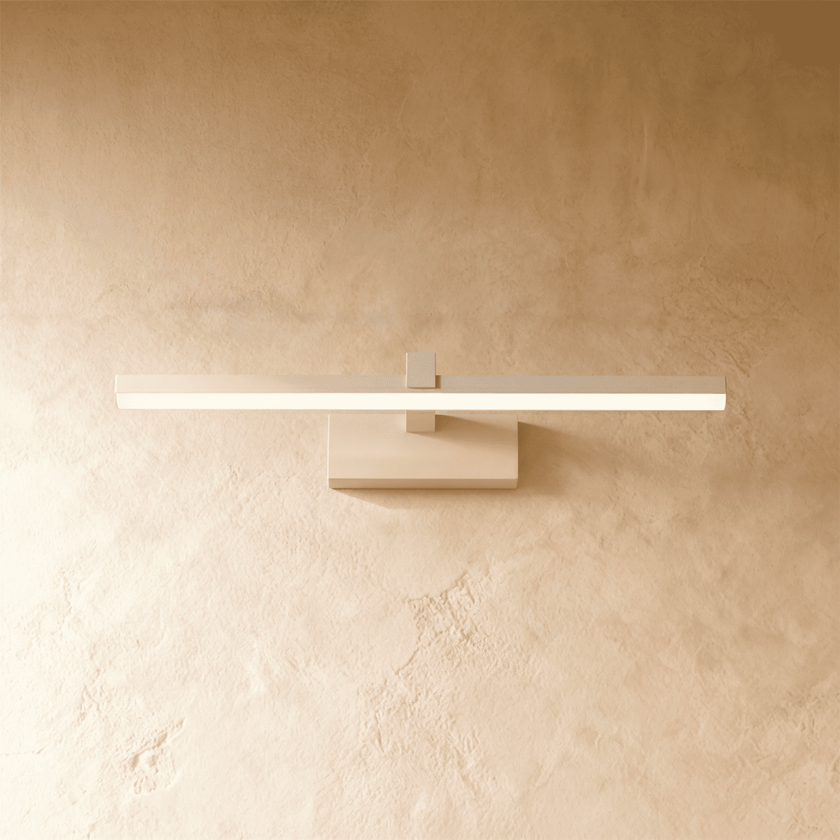 Clérachic white linear wall light with a slender glowing bar mounted flush on a plaster wall via a small plate.