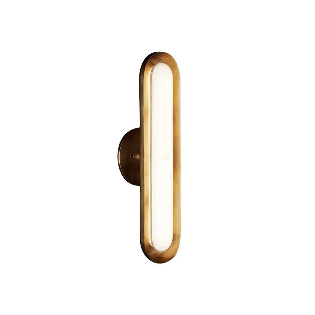 Side view of a single Clérachic capsule wall light, showing its gold rim and the shallow round brass plate behind it.