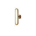 Side view of a single capsule wall light from Clérachic, with a gold rim, a frosted lens and a small gold round plate behind it.