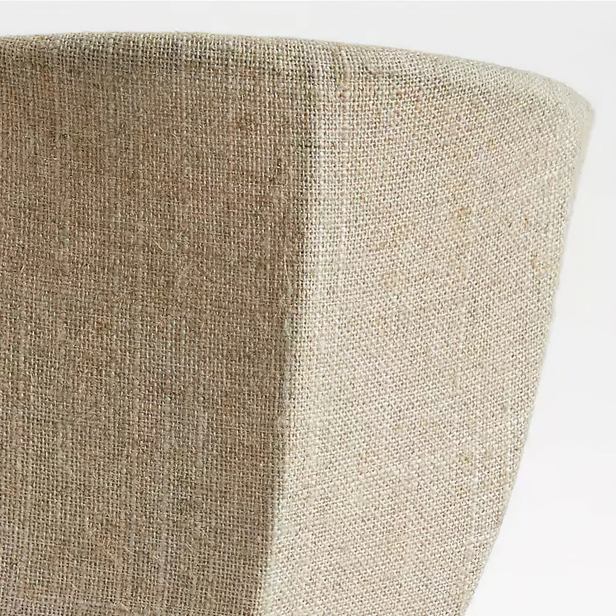 Close view of the woven linen on the rim and seam of this Clérachic wall sconce.