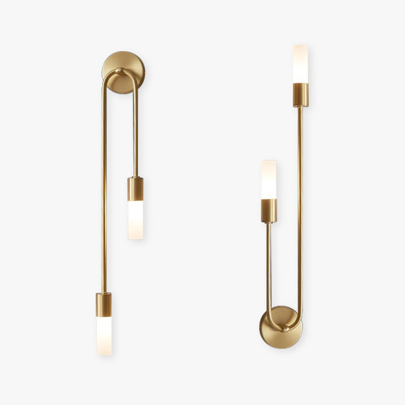The Clérachic gold stick sconce shown in single- and double-shade versions, lit against white.