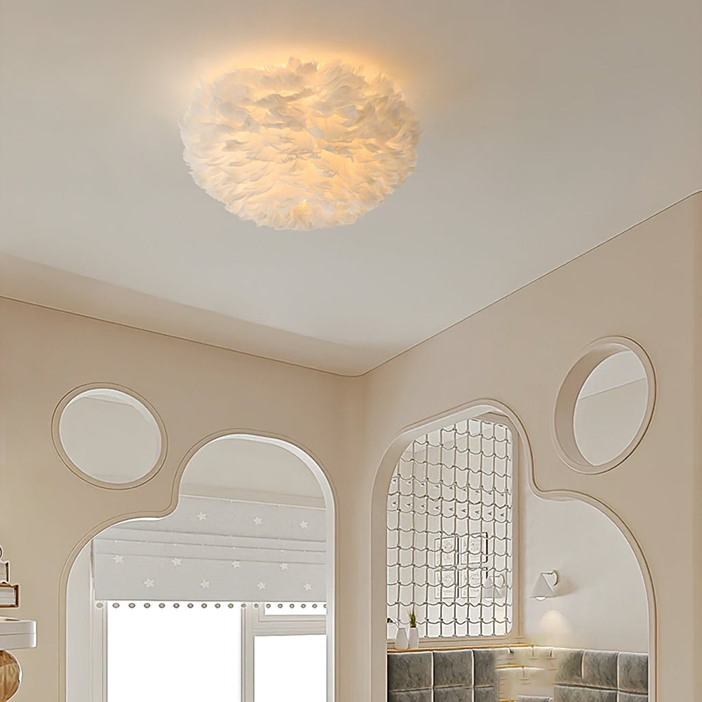 White feather ceiling light from Clérachic glowing above a room with curved arch openings and round mirrors in cream walls.
