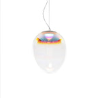 A Clérachic clear glass pendant on white with a thin cord, its rounded shade showing a band of red, pink and blue near the top.