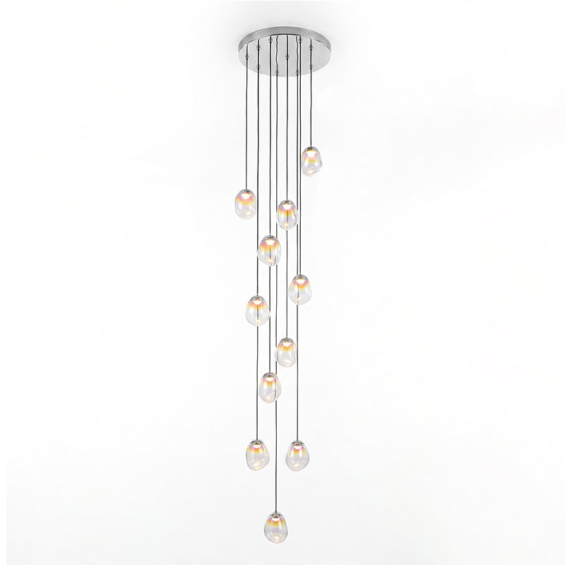 Render of a long Clérachic cluster with many glass teardrop pendants at varied heights from one round chrome ceiling plate.