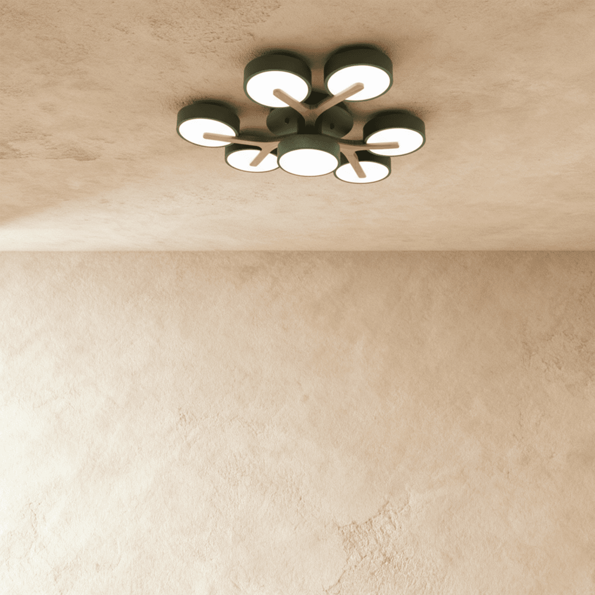 The Clérachic ceiling light in green, photographed from below with its seven-head branching cluster lit.