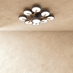 A closer view of the Clérachic ceiling light in gray, showing the dense nine-head branching cluster overhead.