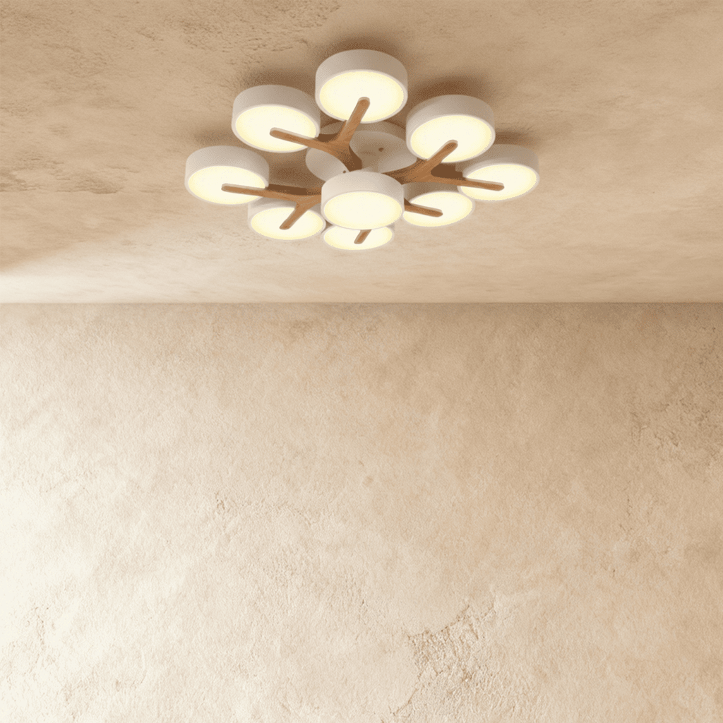 Clérachic's ceiling light in white, nine round diffusers branching from a central wood-topped base overhead.