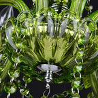 Underside of a Clérachic green glass chandelier cup with a polished chrome finial and strings of octagonal green crystal beads.