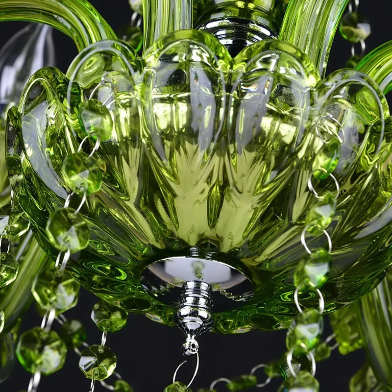 Underside of a Clérachic green glass chandelier cup with a polished chrome finial and strings of octagonal green crystal beads.