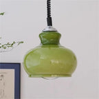 Clérachic pendant light at dusk, a warmer read of the same shade.