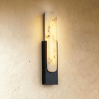 Clérachic black-framed alabaster wall sconce with a softly veined stone insert set into a slim iron frame.