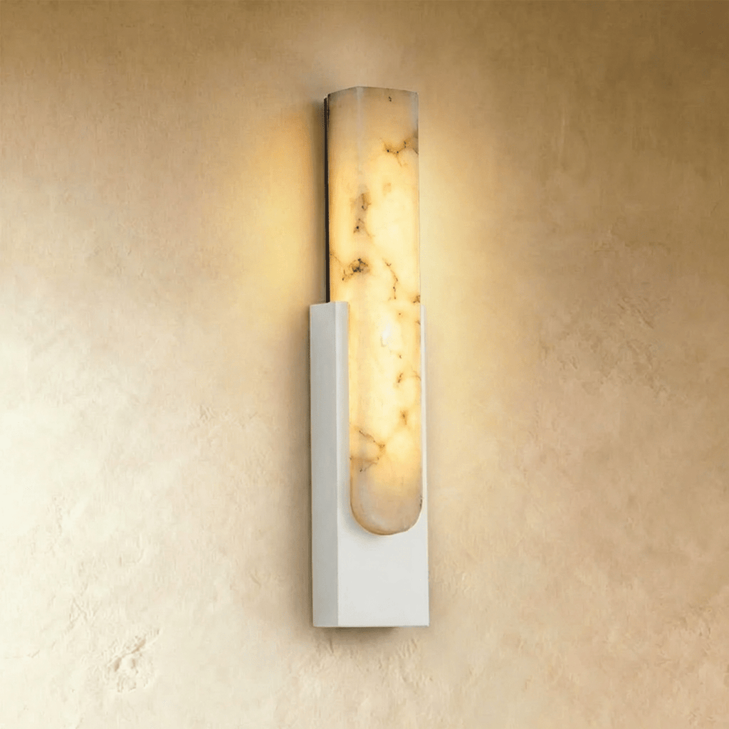 Clérachic white-framed alabaster wall sconce with a veined stone insert set into a slim painted iron frame.