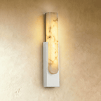 Clérachic white-framed alabaster wall sconce with a veined stone insert set into a slim painted iron frame.