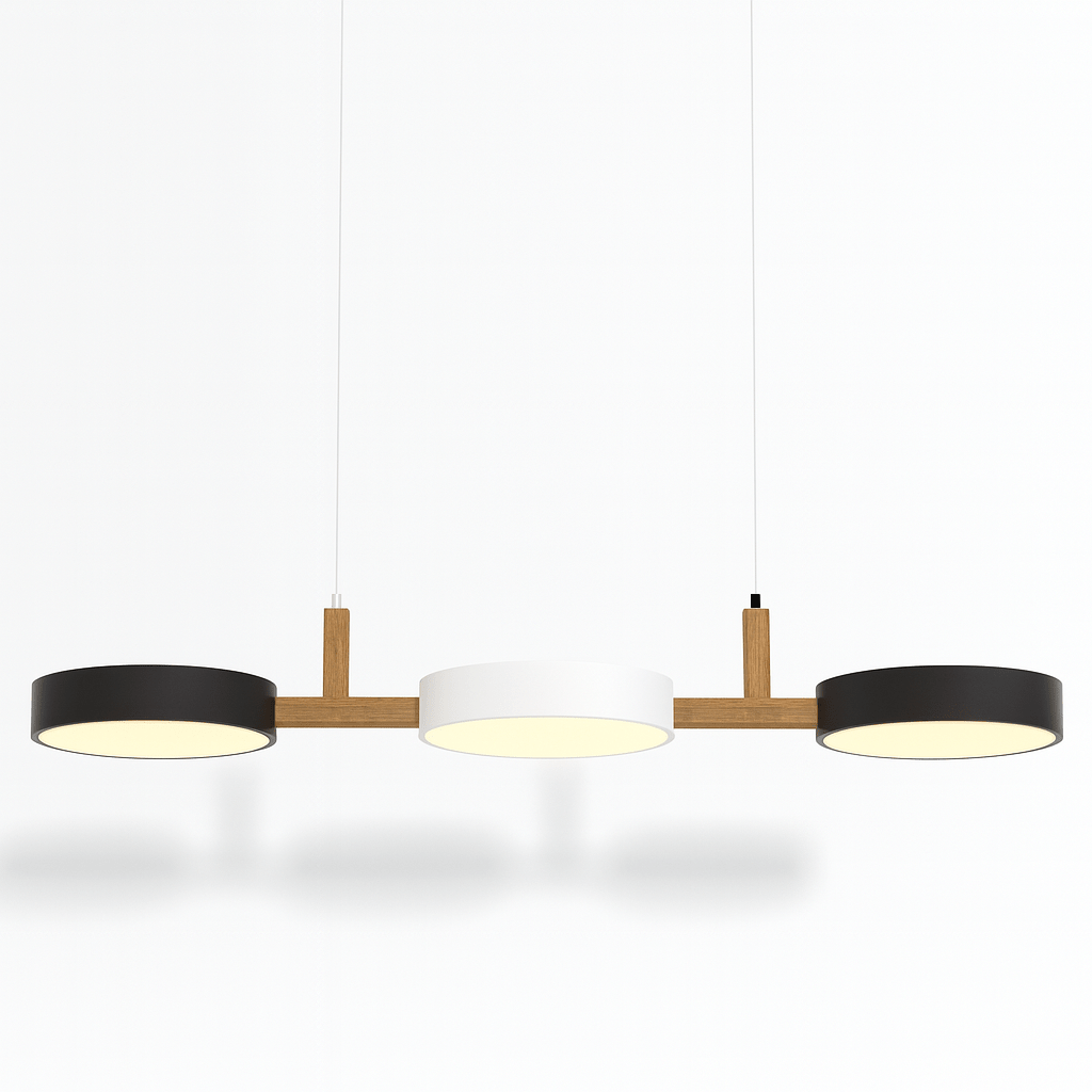 This Clérachic three-light pendant shows dark drum shades either side of a white centre shade, cables bare.