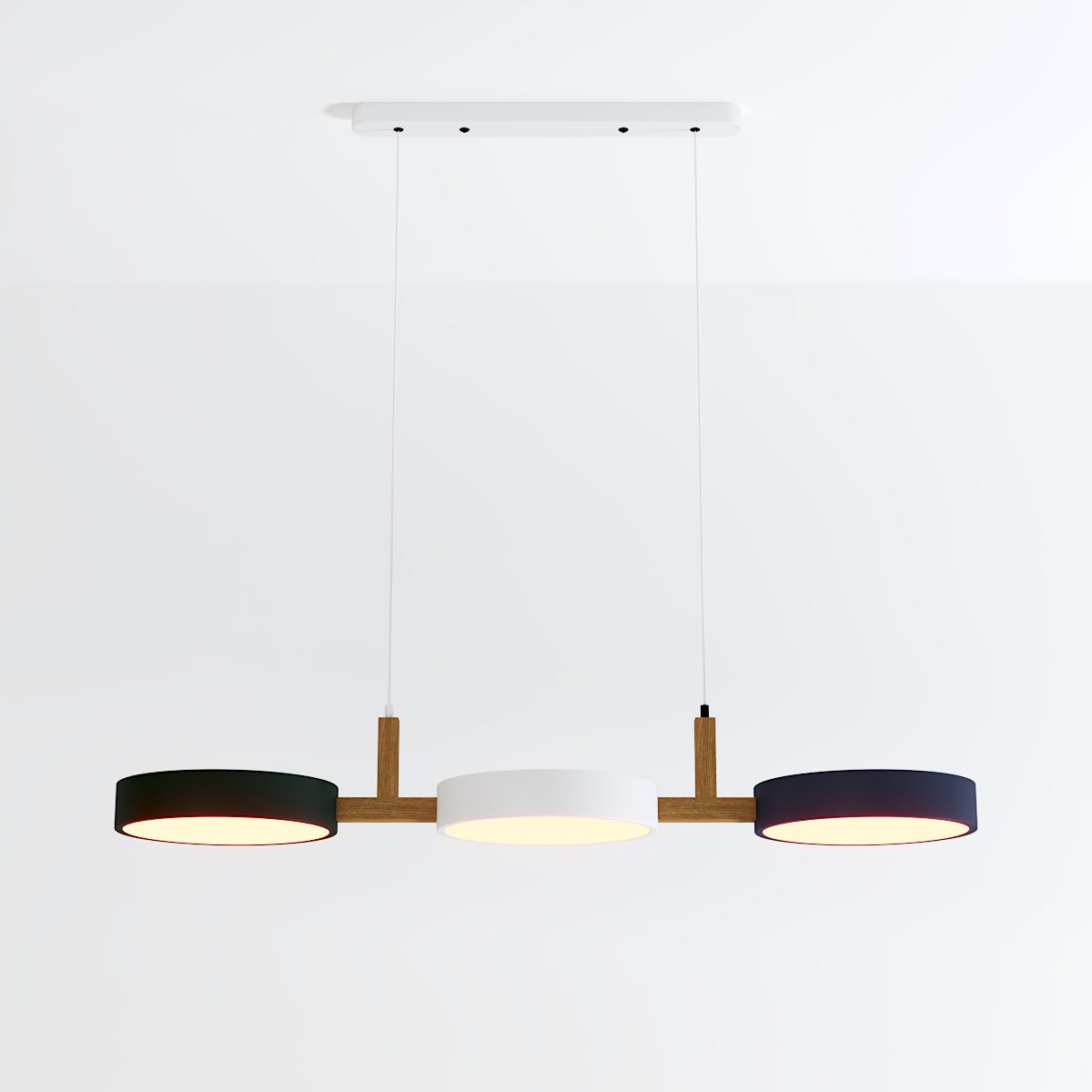 This Clérachic three-light pendant shows dark navy outer shades framing a white centre disc on white ground.