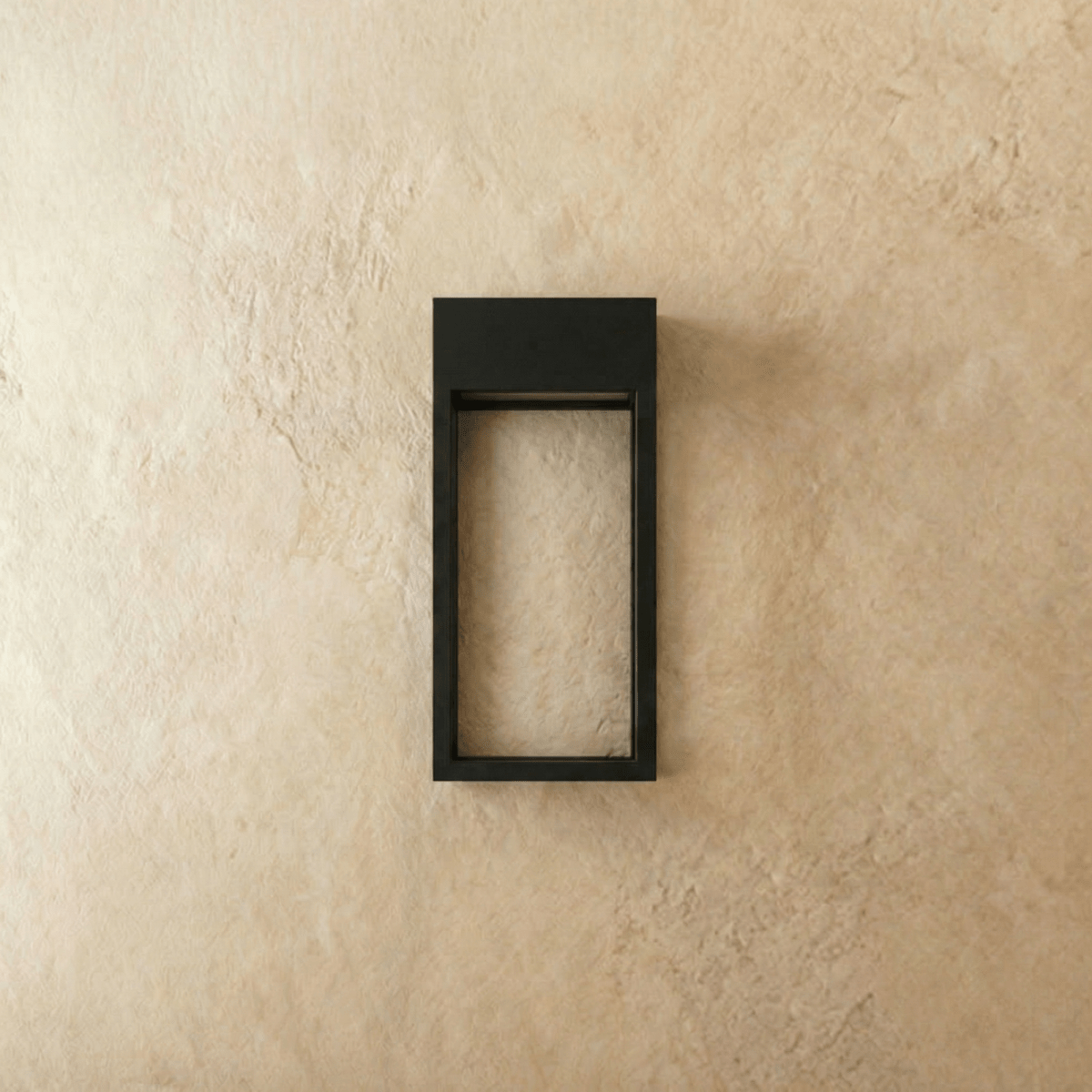 Clérachic grey steel wall sconce frame shown empty and unlit, mounted square against a plain plaster wall.