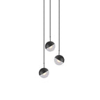 Three matt black Clérachic globe pendants with frosted lower halves, hung at staggered heights on a white backdrop.